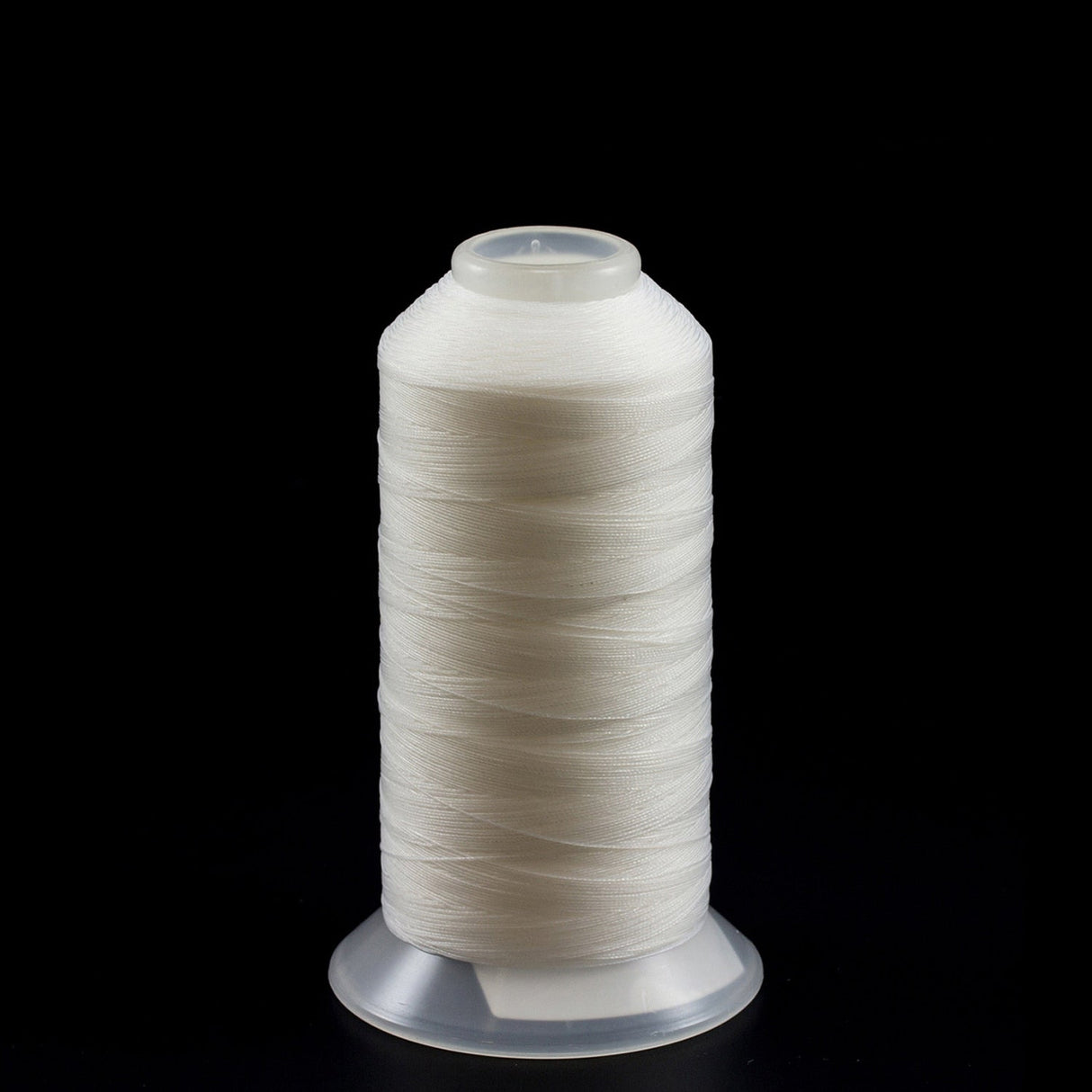 Gore Tenara Thread #M1003-MTR-L-5 Size 1850 Denier Clear 8-oz Gore Tenara Thread #M1003-MTR-L-5 Size 1850 Denier Clear 8-oz